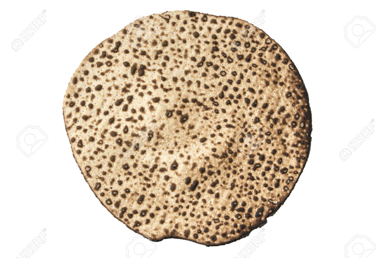 27499652-Traditional-Hand-made-Round-Shmurah-matzoh-jewish-passover-bread-isolated-Stock-Photo.jpg